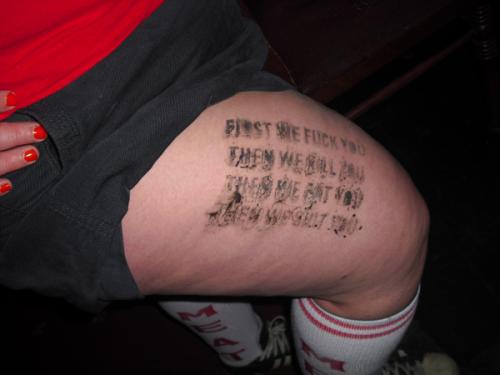 Leg with Homosexual Death Drive lyrics stencilled on